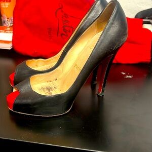 Christian louboutin classic peep toe pumps. Size 36